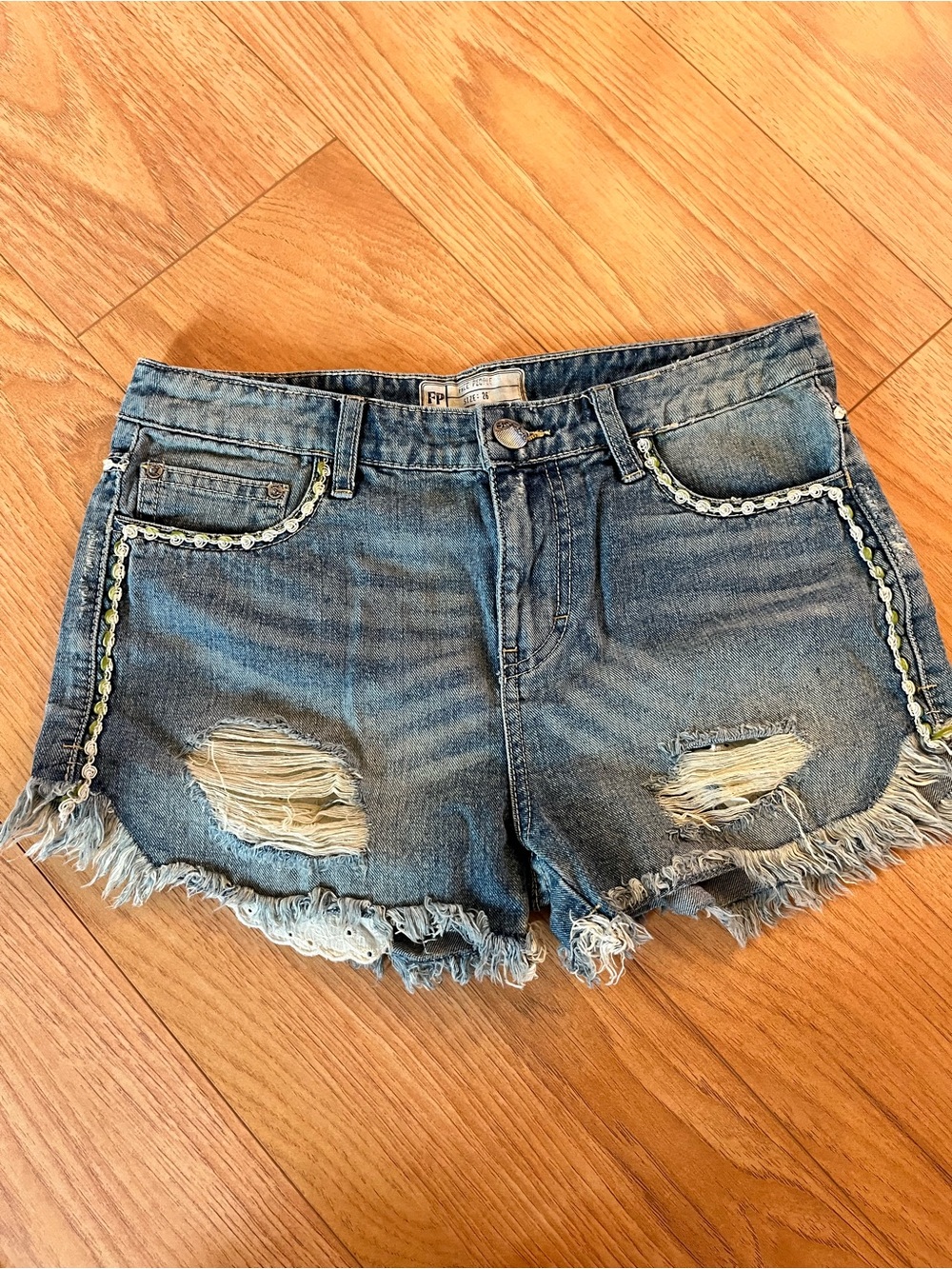 Free People Washed Blue Distressed Denim Shorts with Trim